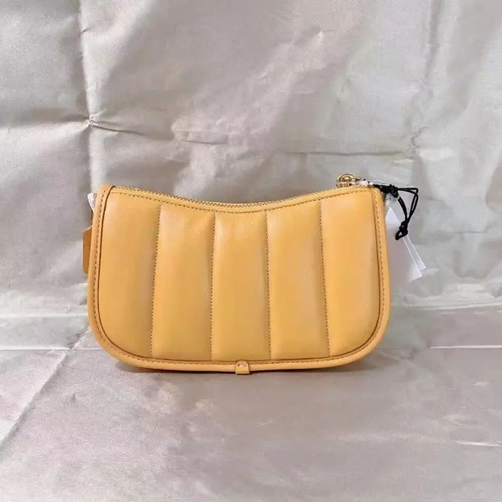 Coach C3490 Swinger 20 With Quilting In Brass/Buttercup